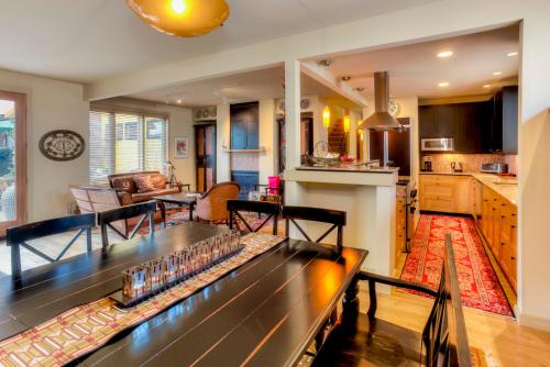 a kitchen and a living room with a bowling alley at The Eagle Harbor Inn in Winslow