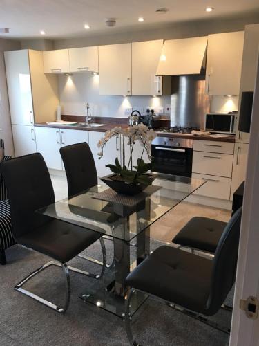 A kitchen or kitchenette at Cardiff luxury apartments