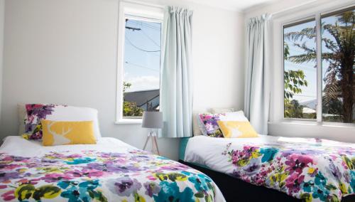 เตียงในห้องที่ Rotorua beauty