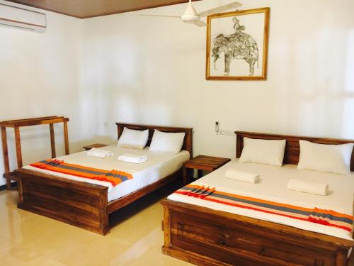 Postel nebo postele na pokoji v ubytování AliKele Hotel & Resort