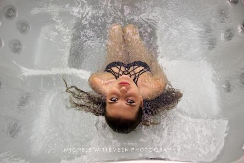 a person floating in a swimming pool at Spiros in Naxos Chora