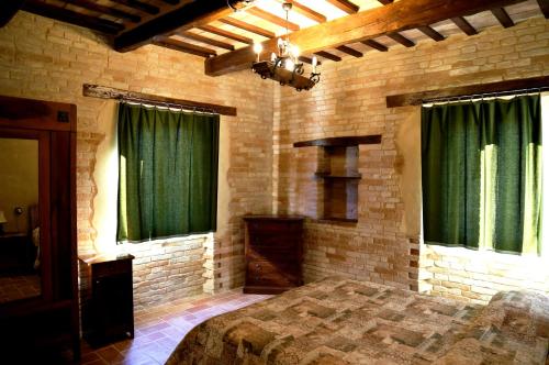 Cama o camas de una habitación en B&B Mik e Ramo