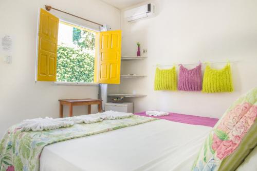 Posteľ alebo postele v izbe v ubytovaní Pousada Canoeiros