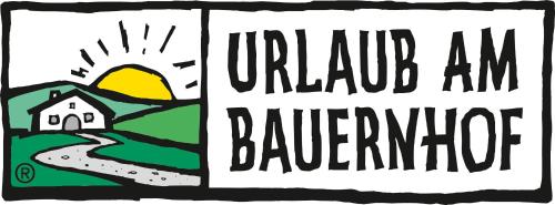 an image of a sign with a house and a road at Hotel Garni Hanslerhof " Urlaub am Bauernhof " in Gerlos
