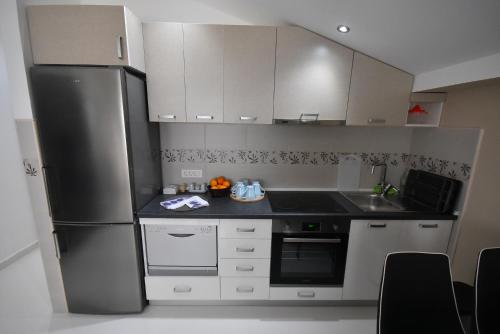 Apartment Aquaにあるキッチンまたは簡易キッチン