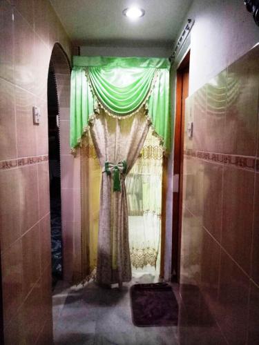 a curtain in a hallway in a room at Farzai Homestay in Lumut