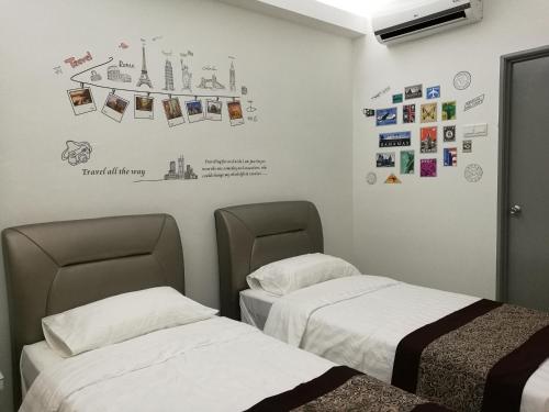 Katil atau katil-katil dalam bilik di D' Cozy Inn