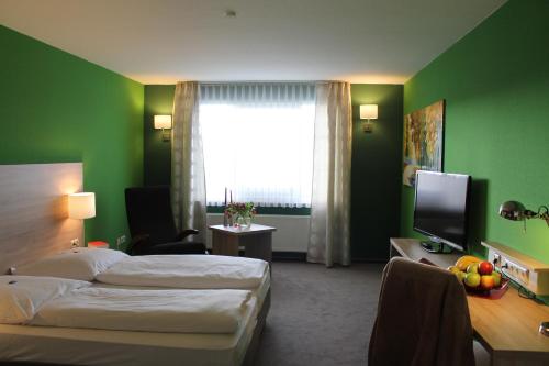 Hotel Westerfeldにあるテレビまたはエンターテインメントセンター