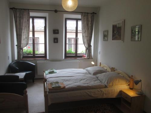 Postel nebo postele na pokoji v ubytování Penzion U Holubů Nový Jičín