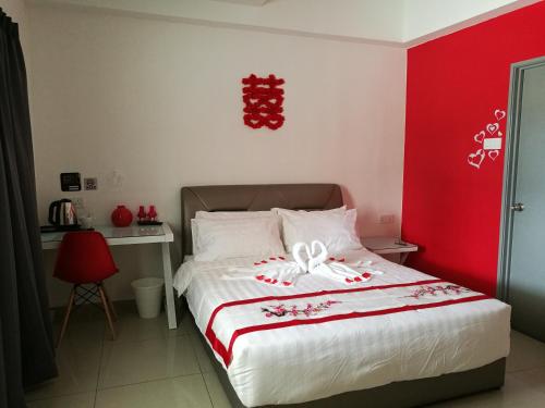 Ένα ή περισσότερα κρεβάτια σε δωμάτιο στο D' Cozy Inn