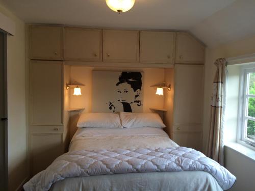 Katil atau katil-katil dalam bilik di Fern Cottage