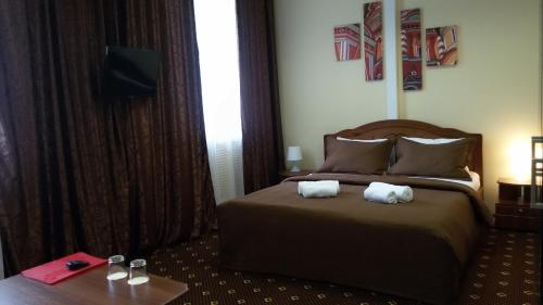 モスクワにあるMini-Hotel Askaのホテルルーム(タオル付)