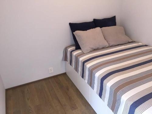 Krevet ili kreveti u jedinici u okviru objekta Knudsen Apartment