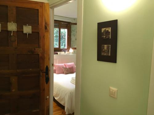 Katil atau katil-katil dalam bilik di Lunas de Siguenza