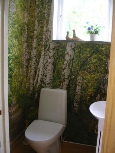 
Een badkamer bij Bo hos Nancy i Ölme
