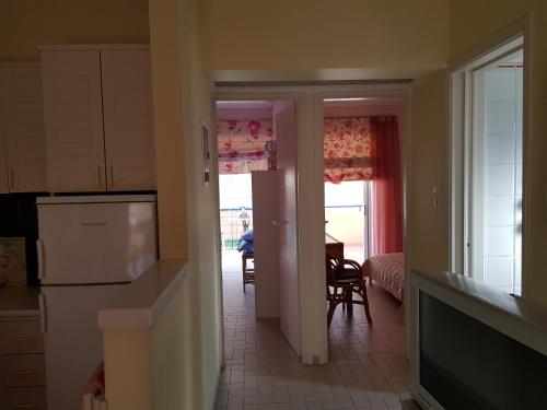 Dapur atau dapur kecil di Rafina K-Apartment