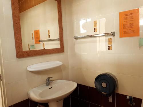 Vonios kambarys apgyvendinimo įstaigoje Mini Cost Apartment&Guesthouse