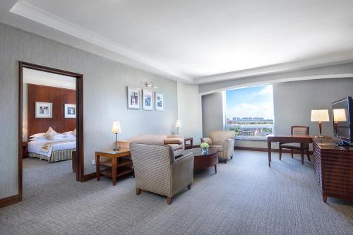Postel nebo postele na pokoji v ubytování Wyndham Beijing North