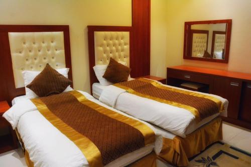Ένα ή περισσότερα κρεβάτια σε δωμάτιο στο Beauty Rayan 2
