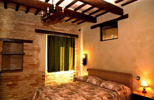 Cama o camas de una habitación en B&B Mik e Ramo