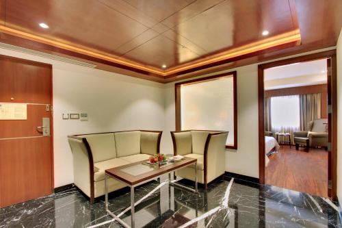Zona de estar de Comfort Inn Insys