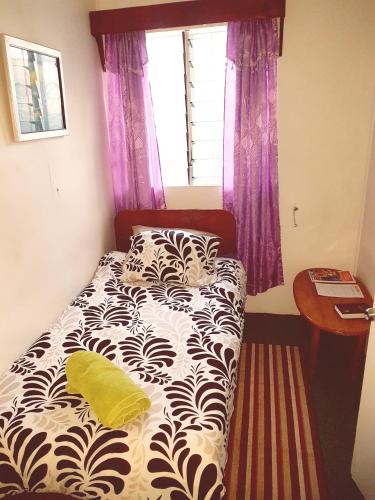 Letto o letti in una camera di Dayspring Lodge