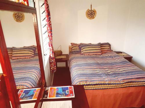 En eller flere senger på et rom på Dayspring Lodge