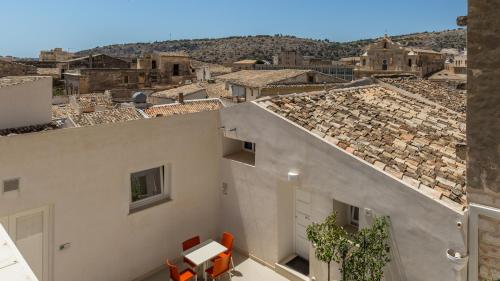 a view of a city from the roof of a building at Scicli Albergo Diffuso in Scicli