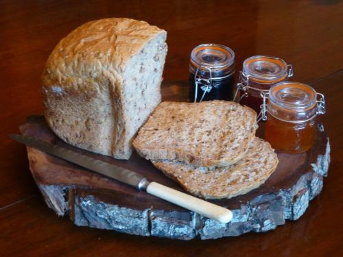 two slices of bread and two jars of honey at Blounts Court Farm in Devizes
