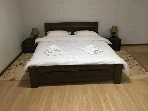 Giường trong phòng chung tại Гостевой дом Юран