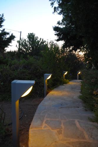 a pathway with lights on the side of it at Villa Kairos Naxos in Glinádhon