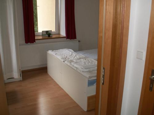 Postel nebo postele na pokoji v ubytování Apartmánový areál Poustevník