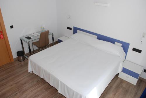 Postel nebo postele na pokoji v ubytování Hotel Moli Boutique