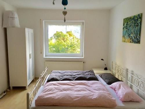 Postel nebo postele na pokoji v ubytování Ferienhaus am Schönberg