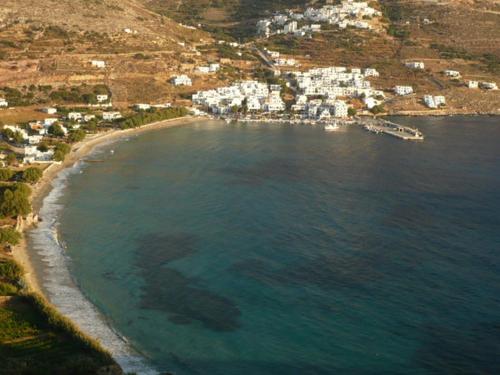 an aerial view of a beach with houses and the ocean at Hotel Filoxenia in Aegiali