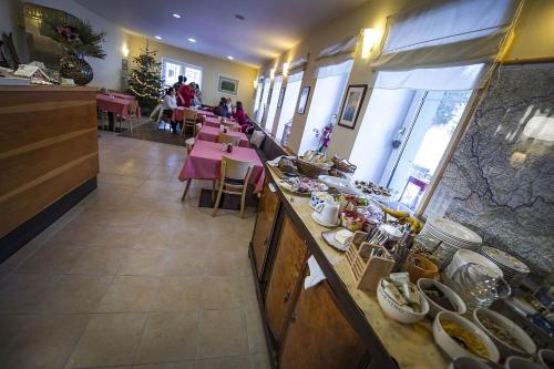 an overhead view of a dining room with tables and chairs at Villa Krejza in Smokovce