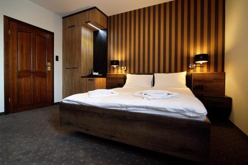 Ein Bett oder Betten in einem Zimmer der Unterkunft Amadeus