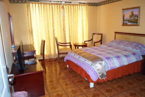 Cama o camas de una habitación en el Hotel Mandarin