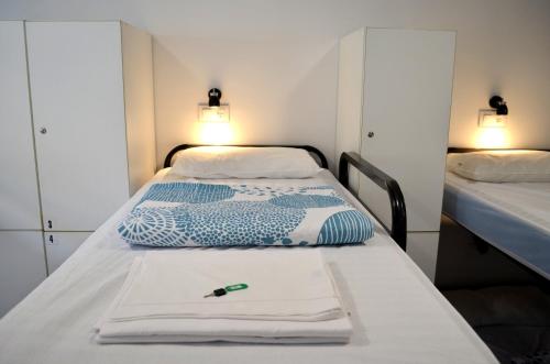 Postel nebo postele na pokoji v ubytování Hostel Allegro