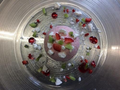 a close up of a metal plate with food on it at Hostaria Da Ivan in Roccabianca
