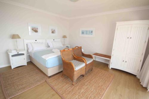 Ένα ή περισσότερα κρεβάτια σε δωμάτιο στο Fairlight Beach House