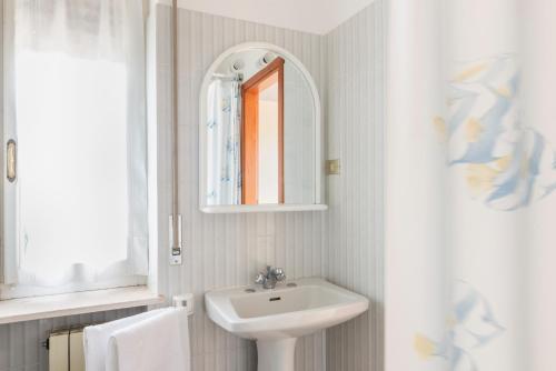 Ванная комната в Hotel Cristina