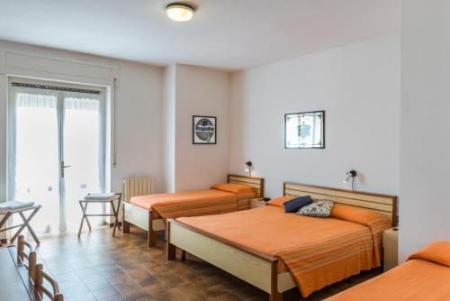 Katil atau katil-katil dalam bilik di Hotel Cristina