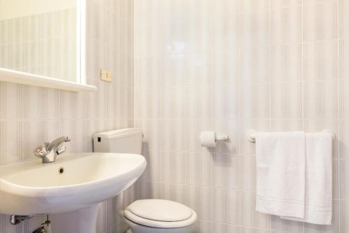 Ванная комната в Hotel Cristina
