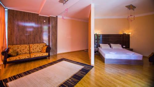 Postel nebo postele na pokoji v ubytování Hotel Borjomi Aisi