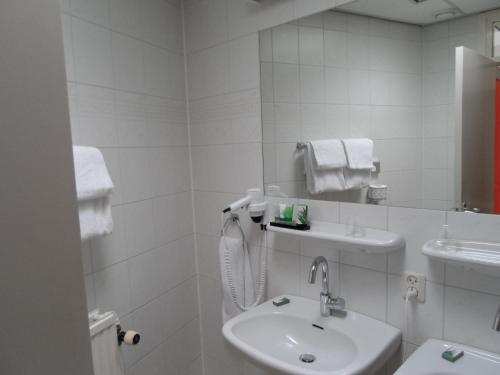 Een badkamer bij Hotel Noordzee
