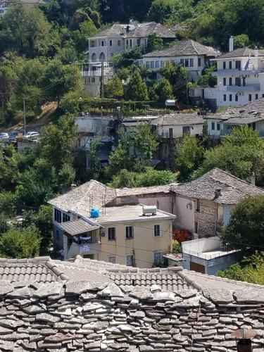 a view of a village with houses and buildings at Lori's traditional house in Gjirokastër