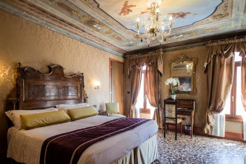 Postel nebo postele na pokoji v ubytování Hotel Casa Nicolò Priuli