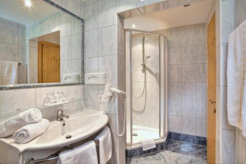 Ванная комната в Bergsporthotel Antonie