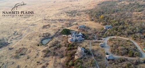 an aerial view of a house on a hill at Nambiti Plains Lodge in Nambiti Private Game Reserve